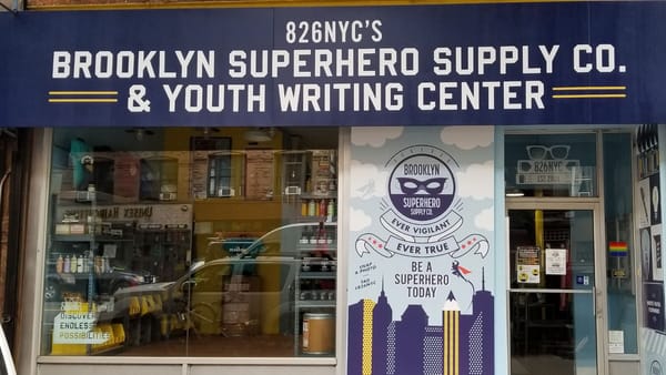 Storefront for 826NYC in Park Slope. The sign reads: "Brooklyn Superhero Supply Co. & Youth Writing Center"