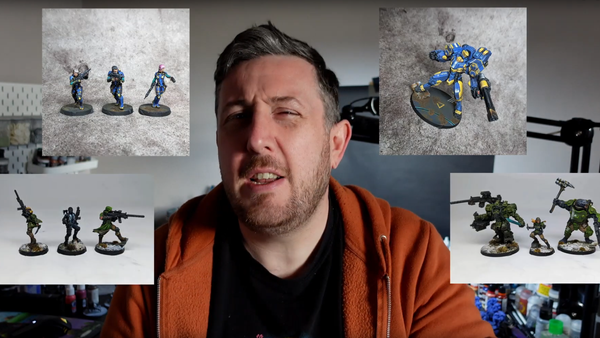 A screengrab from YouTube showing Stu of Tesseract Minis surrounded by Infinity minis