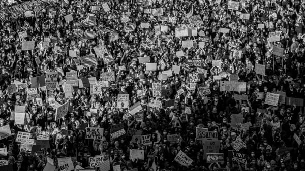 A black and white picture of a crowd